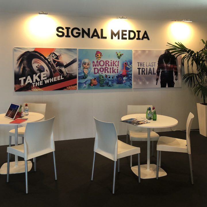Signal Media Stand MIPCOM Button design